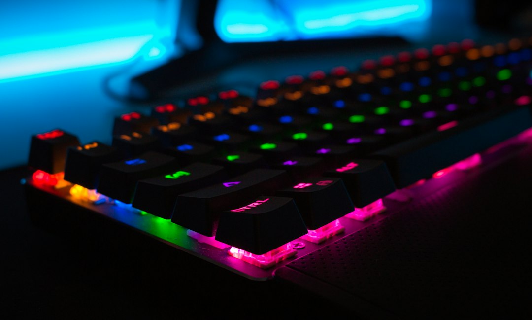 Gaming keyboard with illuminated keys on a desk